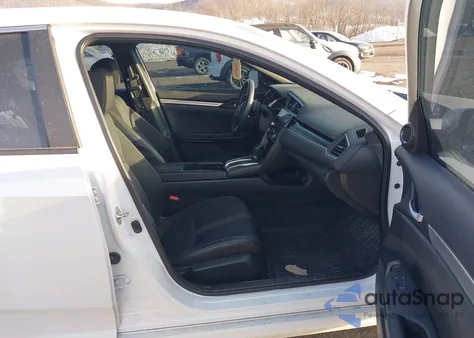 2020 Honda Civic Sport from USA, damaged, VIN 2HGFC2F84LH568957